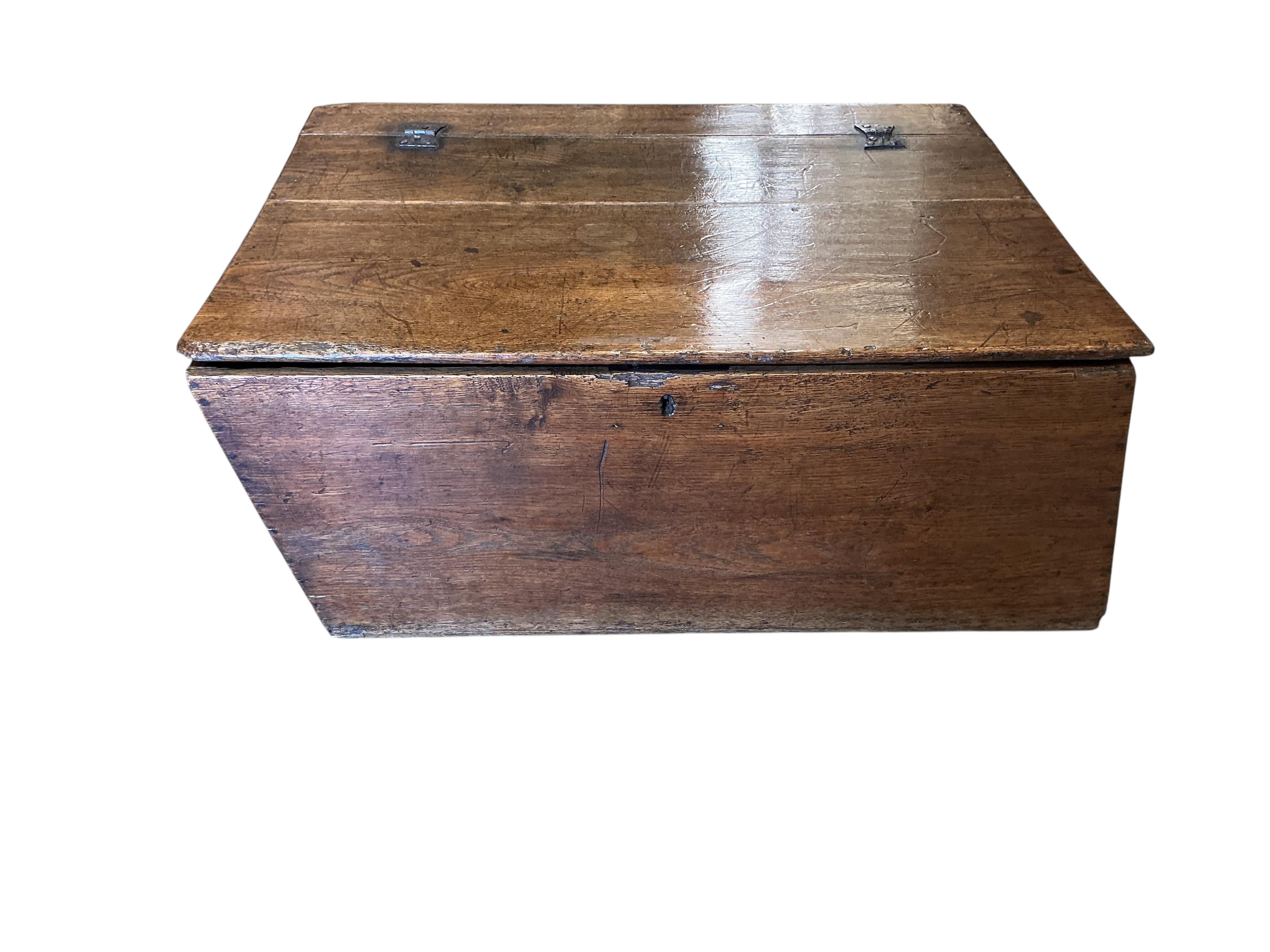 An unusually shaped 18th century oak box, width 72cm, depth 52cm, height 30cm